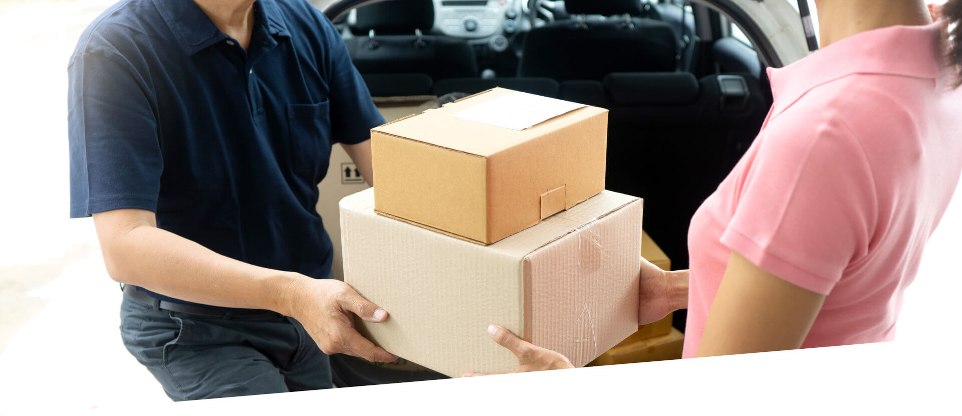 man delivering a packing to a home